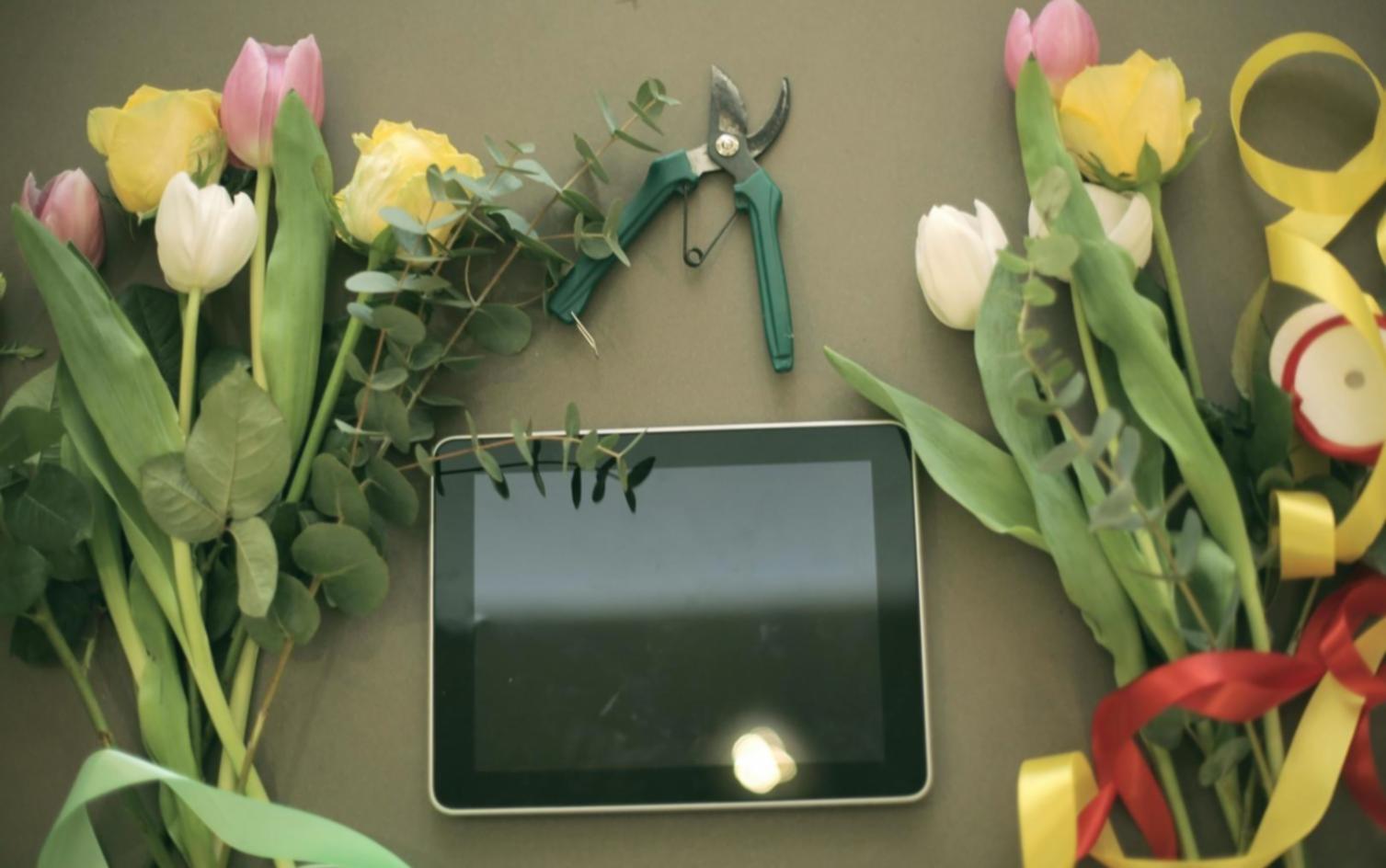 Participant Daryna Kovalenko at a floral arrangement workshop